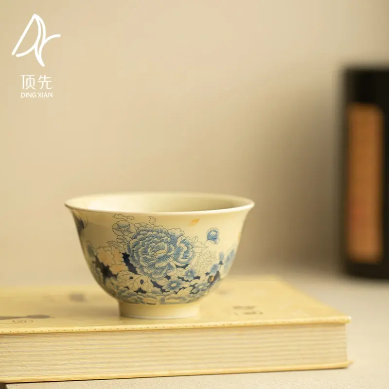 "Blue Rhyme Floral" Kaleidoscope Bowl-Cup: Exquisite Chinese-style porcelain tea set for women, showcasing elegant floral beauty.